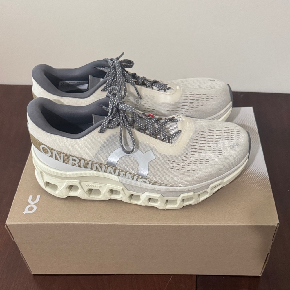 On Running Cream and Gray Sneakers